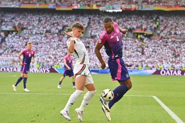 Jonathan Tah (GER), Aktion,Zweikampf gegen Milos KERKEZ (HUN). Gruppenphase Gruppe A Deutschland (GER) - Ungarn (HUN) 2-0 am 19.06.2024, Stuttgart Arena. Fussball UEFA EURO, EM, Europameisterschaft,Fussball 2024 GERMANY vom 14.06.2024 - 14.07.2024.