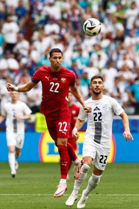 MUNCHEN, 20-06-2024, Allianz Arena. European Football Championship Euro2024, Group stage match no.18 between Slovenia and Serbia, Serbia player Sasa Lukic, Slovenia player Adam Cerin Slovenia - Serbia (Euro2024)  x25540747x Copyright: