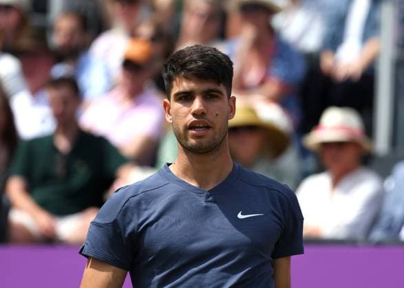 20th June 2024; Cinch Championships, Queens Club, West Kensington, London, England: Cinch Championships Queens Club, Day 4; A fly interrupts Carlos Alcaraz (ESP) serving to Jack Draper (GBR), mens singles match  ActionPlus12657214 JohnxPatrickxFletcher
