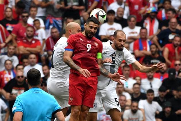 Munich, Germany, June 20st 2024: Jon Gorenc Stankovic of Slovenia (L) in action against Aleksandar Mitrovic of Serbia (C) during the UEFA EURO, EM, Europameisterschaft,Fussball 2024 football match between Slovenia and Serbia at Munich Football Arena, Munich, Germany. (Natasa Kupljenik SPP) Copyright: xNatasaxKupljenikx xSPPx spp-en-NaKuSp-NNP_3311
