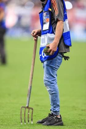Football - UEFA EURO, EM, Europameisterschaft,Fussball 2024 - Group C - Denmark v England 20th June 2024 - UEFA EURO 2024 - Group C - Denmark v England - The groundsman holds a chuck on the pitch in his hand - Photo: Simon Stacpoole Offside. Frankfurt Germany Copyright: xSimonxStacpoolexOffside