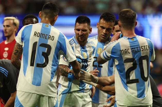 Argentina s forward Lionel Messi (C) is helped by teammates during the Copa America USA 2024, group A, groupe stage match between Argentina and Canada, at Mercedes Benz stadium in Atlanta, on June 20, 2024. ATLANTA UNITED STATES Copyright: xALEJANDROxPAGNIx