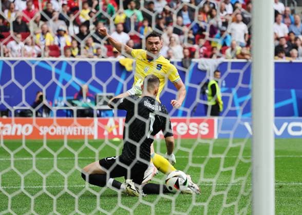 Dusseldorf, Germany, 21st June 2024. Roman Yaremchuk of Ukraine scores their second goal past Martin Dubravka of Slovakia during the UEFA European Championships match at Dusseldorf Arena, Dusseldorf. Picture credit should read: David Klein Sportimage EDITORIAL USE ONLY. No use with unauthorised audio, video, data, fixture lists, club league logos or live services. Online in-match use limited to 120 images, no video emulation. No use in betting, games or single club league player publications. SPI-3201-0070