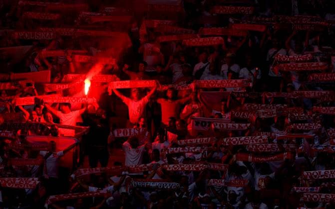 Polish fan light flares ahead of kick off Poland v Austria, UEFA European Championship, EM, Europameisterschaft 2024, Group D, Football, Olympiastadion, Berlin, Germany, 21 Jun 2024 EDITORIAL USE ONLY No use with unauthorised audio, video, data, fixture lists, club league logos or live services. Online in-match use limited to 120 images, no video emulation. No use in betting, games or single club league player publications. Copyright: xKieranxMcManus Shutterstockx 14543876m