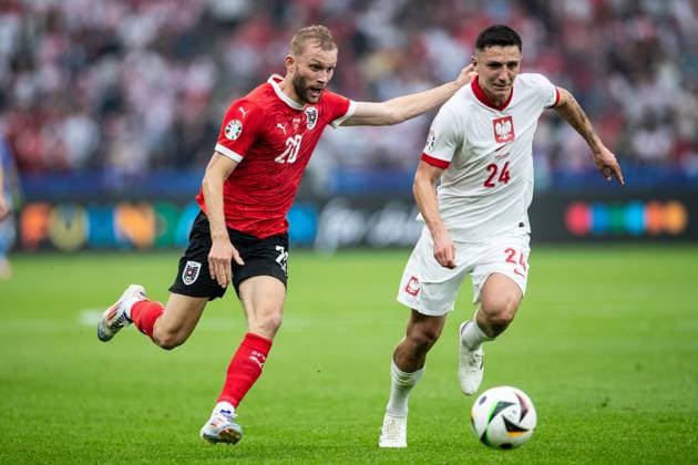 UEFA EURO, EM, Europameisterschaft,Fussball 2024: Polen - Österreich; 21.06.2024 Kondar Laimer (Österreich, 20), Bartosz Slisz (Polen, 24) UEFA EURO 2024: Polen - Österreich; Olympiastadion, Berlin; 21.06.2024 Copyright: xBEAUTIFULxSPORTS Buriakovx