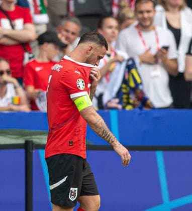 Fussball, Herren, Saison 2023 24, Euro 2024 Gruppe D (2. Spieltag) in Berlin, Polen - Österreich, Marko Arnautovic (Österreich) kämpft nach seinem Tor zum 1:3 mit den Tränen, 21.06. 2024, Copyright: xSebastianxRäppold MatthiasxKochx