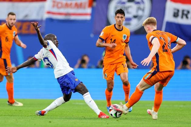 Netherlands v France: Group D - UEFA EURO, EM, Europameisterschaft,Fussball 2024 N Golo Kante of France battles for possession with Jerdy Schouten of Netherlands during the UEFA EURO 2024 group stage match between Netherlands and France at Football Stadium Leipzig on June 21, 2024 in Leipzig, Germany. SanjinxStrukic PIXSELL