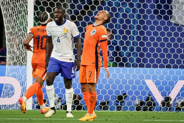 Simons Xavi Quentin Shay XAVI 7 Forward et Upamecano Dayot UPAMECANO 4 Defender lors du match France vs Netherlands groupe D de l Euro 2024 FOOTBALL : France vs Netherlands- Euro 2024 Groupe D, Leipzig Stadium - 21 06 2024 ElyxandroCegarra Panoramic 