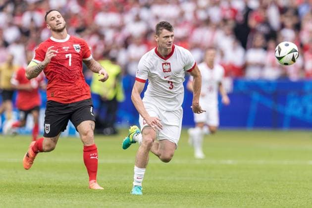Poland v Austria: Group D - UEFA EURO, EM, Europameisterschaft,Fussball 2024 Marko Arnautovic and Pawel Dawidowicz are playing during the Poland vs. Austria match in the UEFA Euro 2024 in Berlin, Germany, on June 21, 2024. Berlin Germany  Copyright: xFotoxOlimpikx originalFilename:jastrzebowski-polandvs240621_np0LM.jpg