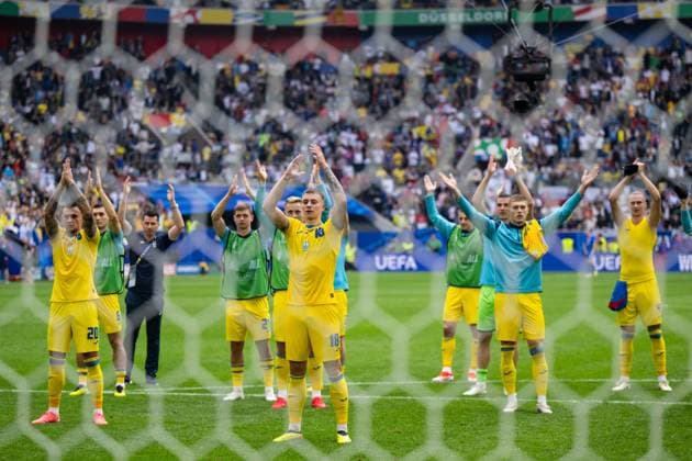 Slovakia v Ukraine: Group E - UEFA EURO, EM, Europameisterschaft,Fussball 2024 Oleksandr Zubkov and Volodymyr Brazhko (L-R) of Ukraine are celebrating victory with their team during the UEFA EURO 2024 group stage match between Slovakia and Ukraine at DÂ¸sseldorf Arena on June 21, 2024 in Dusseldorf, Germany. Duesseldorf Germany  Copyright: xHeshamxElsherifx originalFilename:elsherif-notitle240621_npnqs.jpg