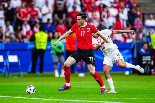 Michael Gregoritsch (Oesterreich, 11), Jakub Kiwior (Polen, 14) GER, Polen vs. Oesterreich, Fussball Europameisterschaft, UEFA EURO, EM, Europameisterschaft,Fussball 2024, Spieltag 2, 21.06.2024 GER, Polen vs. Oesterreich, Fussball Europameisterschaft, UEFA Euro 2024, Spieltag 2, 21.06.2024 Berlin Copyright: xEibner-Pressefoto MarcelxvonxFehrnx EP_MFN