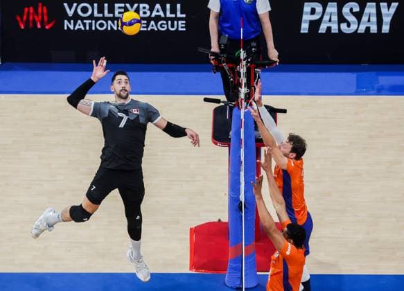 (240622) -- PASAY CITY, June 22, 2024 -- Stephen Timothy Maar (L) of Canada spikes the ball during the match between Canada and the Netherlands at the Men s Volleyball Nations League (VNL) 2024 in Pasay City, the Philippines, on June 22, 2024. ) (SP)THE PHILIPPINES-PASAY CITY-VOLLEYBALL-NATIONS LEAGUE-MEN-CANADA VS NETHERLANDS ROUELLExUMALI 