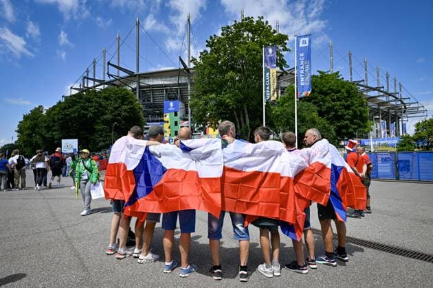 Czech fans are seen with national flags prior to the Group F match of the European Football Championship: Georgia vs Czechia, outside the Volksparkstadion in Hamburg, Germany, on June 22, 2024. (CTKxPhoto VitxSimanek) CTKPhotoP2024062202963  CTKPhotoP2024062202963