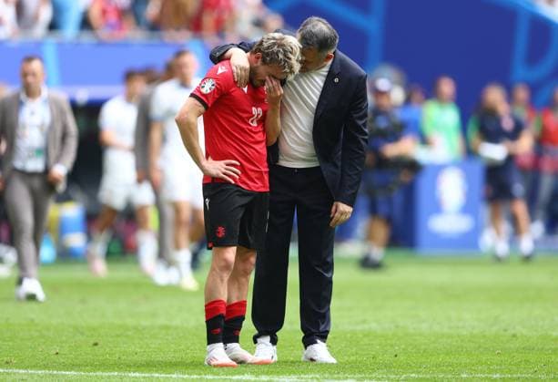 Georgia manager Willy Sagnol comforts Saba Lobzhanidze of Georgia after missing a game winning chance at full time Georgia v Czechia, UEFA European Championship, EM, Europameisterschaft 2024, Group F, Football, Volksparkstadion, Hamburg, Germany, 22 Jun 2024 EDITORIAL USE ONLY No use with unauthorised audio, video, data, fixture lists, club league logos or live services. Online in-match use limited to 120 images, no video emulation. No use in betting, games or single club league player publications. Copyright: xKieranxMcManus Shutterstockx 14548025ct