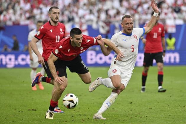 L-R Giorgi Chakvetadze (GEO), Luka Lochoshvili (GEO) and Vladimir Coufal (CZE) in action during the Group F match of the European Football Championship: Georgia vs Czechia, in Hamburg, Germany, on June 22, 2024. (CTKxPhoto VitxSimanek) CTKPhotoP2024062204298  CTKPhotoP2024062204298