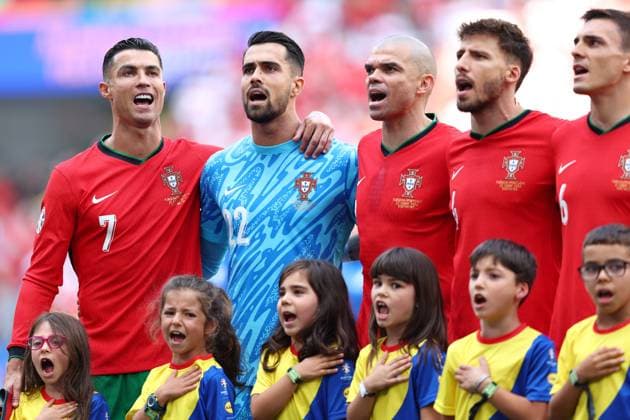 Turkey v Portugal 22 June 2024, Dortmund - UEFA EUROs - Group F - Turkey v Portugal - Cristiano Ronaldo of Portugal (L) sings the national anthem alongside Portugal goalkeeper Diego Costa, Pepe of Portugal (C), Ruben Dias of Portugal (2R) and Joao Palhinha of Portugal (R) - Photo: Charlotte Wilson Offside. Dortmund Germany Copyright: xCharlottexWilsonx xOffsidexOffside