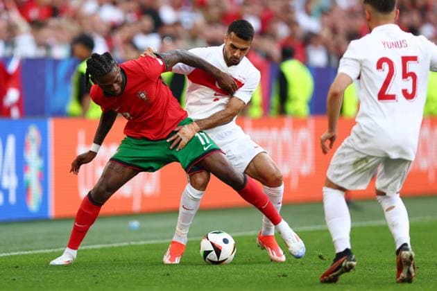 Turkey v Portugal 22 June 2024, Dortmund - UEFA EUROs - Group F - Turkey v Portugal - Rafael Leao of Portugal battles with Zeki Celik of Turkey - Photo: Charlotte Wilson Offside. Dortmund Germany Copyright: xCharlottexWilsonx xOffsidexOffside