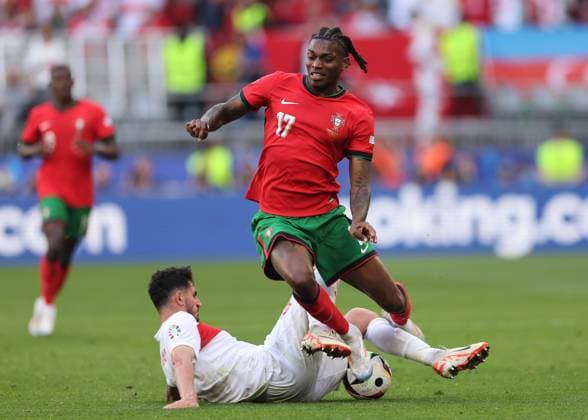 Dortmund, Germany, 22nd June 2024. Samet Akaydin of Turkey tackles Rafael Leao of Portugal during the UEFA European Championships match at BVB Stadion, Dortmund. Picture credit should read: David Klein Sportimage EDITORIAL USE ONLY. No use with unauthorised audio, video, data, fixture lists, club league logos or live services. Online in-match use limited to 120 images, no video emulation. No use in betting, games or single club league player publications. SPI-3202-0059