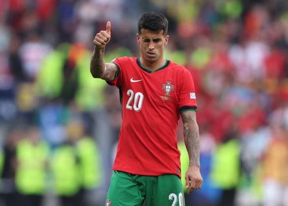 Dortmund, Germany, 22nd June 2024. A wink from Joao Cancelo of Portugal during the UEFA European Championships match at BVB Stadion, Dortmund. Picture credit should read: David Klein Sportimage EDITORIAL USE ONLY. No use with unauthorised audio, video, data, fixture lists, club league logos or live services. Online in-match use limited to 120 images, no video emulation. No use in betting, games or single club league player publications. SPI-3202-0081