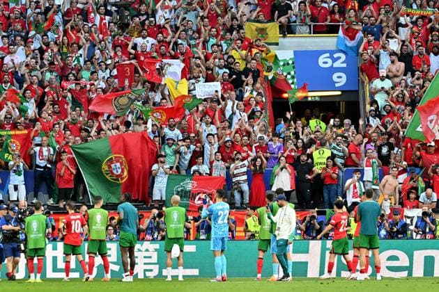 22.06.2024, xsltx, Fussball EM 2024, Türkei - Portugal emspor, v.l. Jubel, Freude, Emotionen ueber den Sieg bei Portugal Emotionen, Fans, Stimmung, Fahnen, Logo, Portugal, Zuschauer, Trikots (DFL DFB REGULATIONS PROHIBIT ANY USE OF PHOTOGRAPHS as IMAGE SEQUENCES and or QUASI-VIDEO) Dortmund