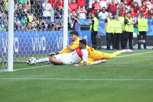 Germany - UEFA EURO, EM, Europameisterschaft,Fussball 2024 - Turkey vs Portugal - 15 06 2024 GERMANY, DORTMUND, JUNE 22. Altay Bayindir of Turkey and Zeki Celik of Turkey try to makes a save as Samet Akaydin of Turkey (not seen) just scored an own goal during the UEFA EURO 2024 group F stage match between Turkey and Portugal, on June 22, 2024 at BVB Stadion in Dortmund, Germany. Photo by Manuel Blondeau AOP.Press Dortmund BVB Stadion Germany Copyright: x ManuelxBlondeau AOP.Pressx AOP20240622 0021