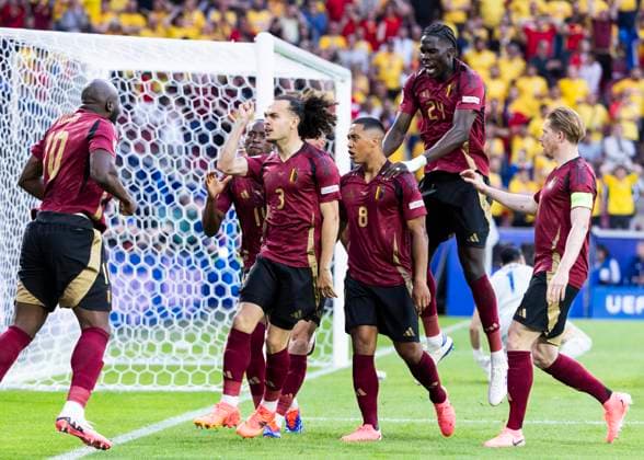 Koeln, RheinEnergieStadion, 22.06.2024: Youri Tielemans of belgium (M) celebrates scoring the 1:0 goal with Romelu Lukaku of belgium and team during the match UEFA European Championship, EM, Europameisterschaft 2024 Belgium v. Romania.