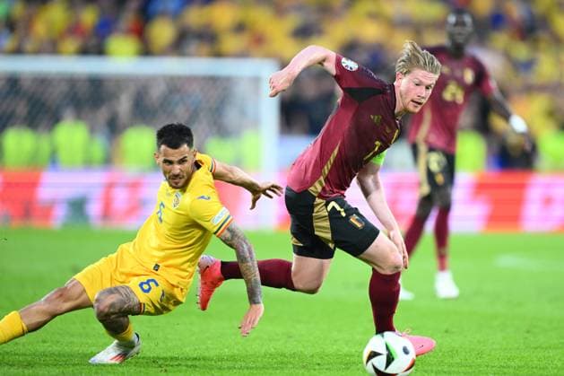 Belgium v Romania Group E - UEFA EURO, EM, Europameisterschaft,Fussball 2024 COLOGNE, GERMANY - JUNE 22 : De Bruyne Kevin forward of Belgium beats Marius Marin midfielder of Romania to the ball during the UEFA EURO 2024 European Football Championship tournament group E stage match between Belgium and Romania at Cologne Stadium on June 22, 2024 in Cologne, Germany, 22 06 2024 Cologne Germany  Copyright: xVincentxKalutx