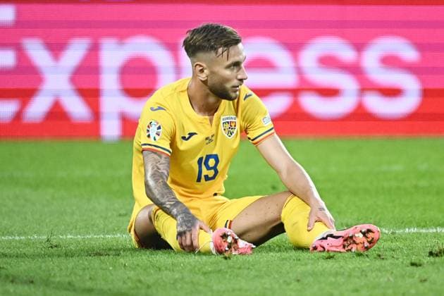 240622 EURO2024 BELGIUM VS ROMANIA Denis DraguÅü (19) of Romania looks dejected during a soccer game between the national teams of Belgium, called the Red Devils and Romania on the second matchday in Group E in the group stage of the UEFA EURO, EM, Europameisterschaft,Fussball 2024 tournament , on Saturday 22 June 2024 in Cologne , Germany . PHOTO Isosport Maarten Straetemans Cologne GERMANY  Copyright: xx 466933