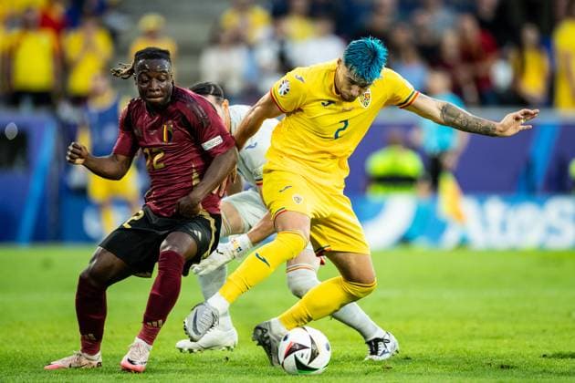 UEFA EURO, EM, Europameisterschaft,Fussball 2024: Belgien - Rumänien; 22.06.2024 Florin Nita (Rumänien, 1), Andrei Ratiu (Rumänien, 2), Jeremy Doku (Belgien, 22) UEFA EURO 2024: Belgien - Rumänien; Cologne Stadion, Köln; 22.06.2024 Copyright: xBEAUTIFULxSPORTS Buriakovx