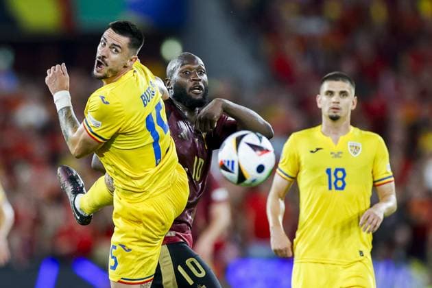 COLOGNE, RheinEnergieStadium , 22-06-2024 , European Football Championship Euro2024, Group stage match no.22 between Belgium and Romania. Romania player Andonie Andrei Burca and Belgium player Romelu Lukaku Belgium - Romania (Euro2024)  x25568751x Copyright: