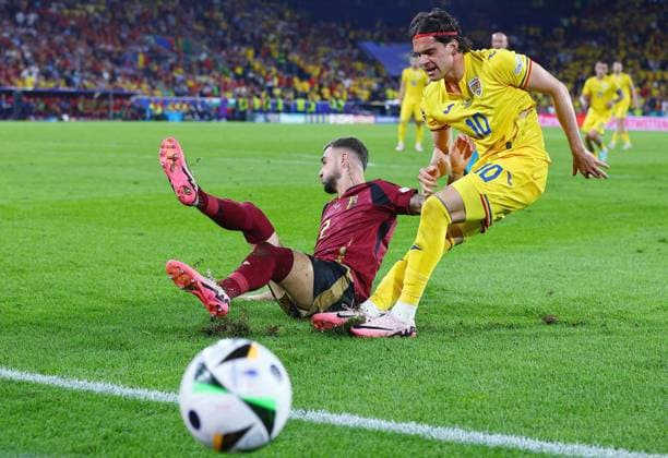 Zeno Debast of Belgium with Ianis Hagi of Romania Belgium v Romania, UEFA European Championship, EM, Europameisterschaft 2024, Group E, Football, Cologne Stadium, Cologne, Germany, 22 Jun 2024 EDITORIAL USE ONLY No use with unauthorised audio, video, data, fixture lists, club league logos or live services. Online in-match use limited to 120 images, no video emulation. No use in betting, games or single club league player publications. Copyright: xMichaelxZemanek Shutterstockx 14548045dk