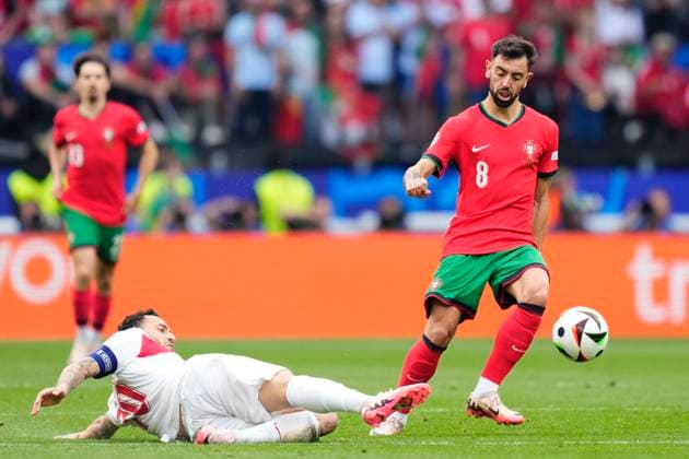 Turkiye v Portugal: Group F - UEFA EURO, EM, Europameisterschaft,Fussball 2024 Bruno Fernandes attacking midfield of Portugal and Manchester United, ManU and Ferdi KadÄ±oglu left-back of Turkey and Fenerbahce compete for the ball during the UEFA EURO 2024 group stage match between Turkiye and Portugal at Football Stadium Dortmund on June 22, 2024 in Dortmund, Germany. Dortmund Germany  Copyright: xJosexBretonx originalFilename:breton-turkiyev240622_npMTO.jpg