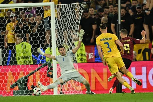 Leandro Trossard (Belgium)Radu Dragusin (Romania)Florin Nita (Romania) during the UEFA EURO, EM, Europameisterschaft,Fussball Germany 2024 match between Belgium 2-0 Romania at Cologne Stadium on June 22, 2024 in Cologne, Germany. Noxthirdxpartyxsales  (257330597)