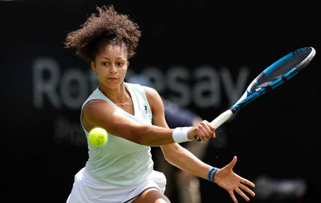 23rd June 2024; Devonshire Park, Eastbourne, East Sussex, England: Rothesay International Eastbourne, Qualifying Day 2, Ranah Akua Stoiber (GBR) plays a backhand against Magda Linette (POL) in their Qualification Final  ActionPlus12659237 HongboxChen