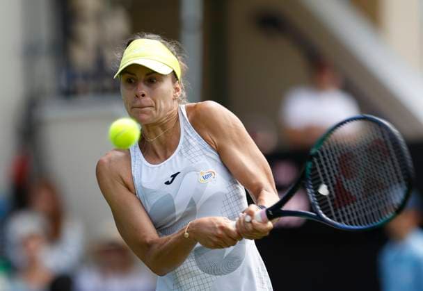 23rd June 2024; Devonshire Park, Eastbourne, East Sussex, England: Rothesay International Eastbourne, Qualifying Day 2, Magda Linette (POL) plays a backhand against Ranah Akua Stoiber (GBR) in their Qualification Final  ActionPlus12659243 HongboxChen
