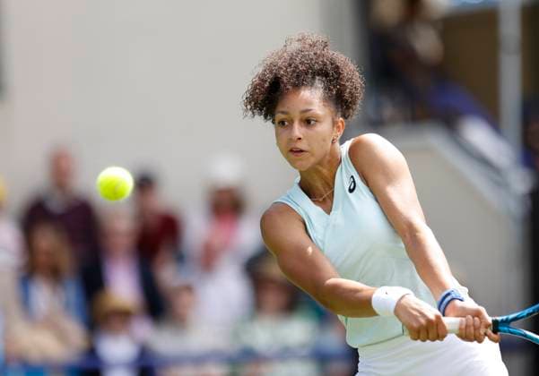 23rd June 2024; Devonshire Park, Eastbourne, East Sussex, England: Rothesay International Eastbourne, Qualifying Day 2, Magda Linette (POL) plays a backhand against Ranah Akua Stoiber (GBR) in their Qualification Final  ActionPlus12659234 HongboxChen