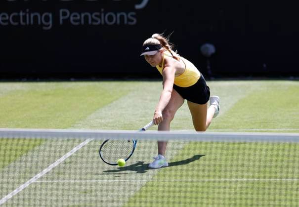 23rd June 2024; Devonshire Park, Eastbourne, East Sussex, England: Rothesay International Eastbourne, Qualifying Day 2, Ella McDonald (GBR) plays a backhand against Ashlyn Krueger (USA) in the Qualification Final  ActionPlus12659391 HongboxChen
