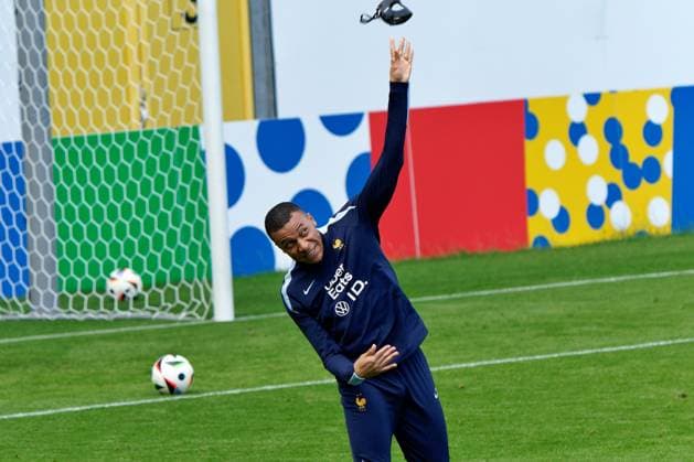 Kylian Mbappe of France annoyed by the mask he throws it during the training session at the Home Deluxe Arena in Paderbon, Germany on 23 June 2024. during UEFA EURO, EM, Europameisterschaft,Fussball 2024 - France training session, UEFA European Football Championship in Leipzig, Germany, June 23 2024  Copyright: xx xx IPA_Agency_IPA47408774