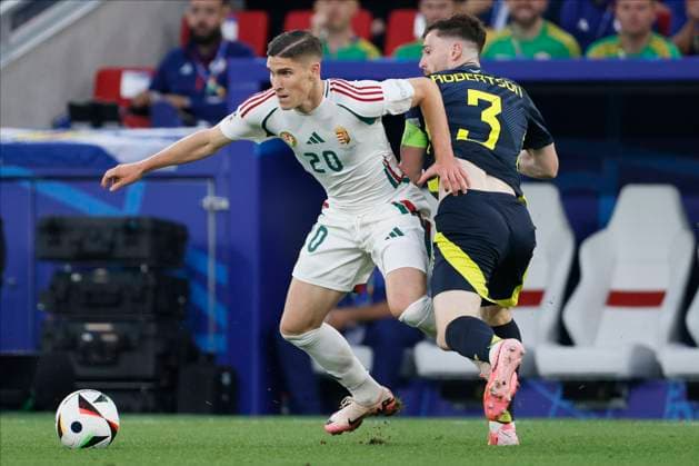 Scotland v Hungary: Group A - UEFA EURO, EM, Europameisterschaft,Fussball 2024 Roland Sallai of Hungary and Andrew Robertson of Scotland challenge during the UEFA EURO 2024 group stage match between Scotland and Hungary at Stuttgart Arena on June 23, 2024 in Stuttgart, Germany. Stuttgart Stuttgart Arena Germany Germany Copyright: xRichardxSellers Sportsphoto APLx 14042334