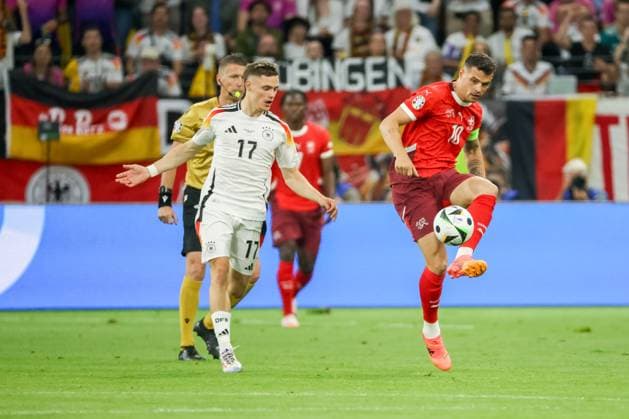 Granit Xhaka (Schweiz, 10) und Florian Wirtz (GER, 17) in Aktion , Fussball, UEFA , Europa Meisterschaft, (Gruppe A) 2024, Schweiz vs. Deutschland, 23.06.2024, Frankfurt Arena, Frankfurt, Deutschland Frankfurt Frankfurt Arena Hessen Deutschland Copyright: xGrantxHubbsx