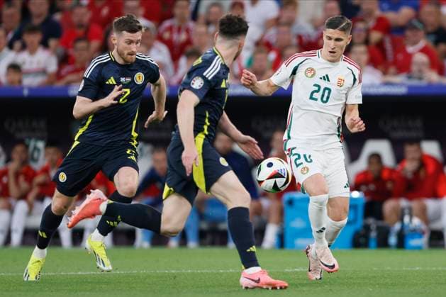Scotland v Hungary: Group A - UEFA EURO, EM, Europameisterschaft,Fussball 2024 Anthony Ralston of Scotland and Roland Sallai of Hungary challenge during the UEFA EURO 2024 group stage match between Scotland and Hungary at Stuttgart Arena on June 23, 2024 in Stuttgart, Germany. Stuttgart Stuttgart Arena Germany Germany Copyright: xRichardxSellers Sportsphoto APLx 14042335