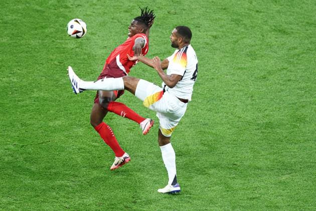 Breel Embolo of Switzerland and Jonathan Tah of Germany Switzerland v Germany, UEFA European Championship, EM, Europameisterschaft 2024, Group A, Football, Frankfurt Arena, Frankfurt am Main, Germany, 23 Jun 2024 EDITORIAL USE ONLY No use with unauthorised audio, video, data, fixture lists, club league logos or live services. Online in-match use limited to 120 images, no video emulation. No use in betting, games or single club league player publications. Copyright: xMattxWest Shutterstockx 14548071at