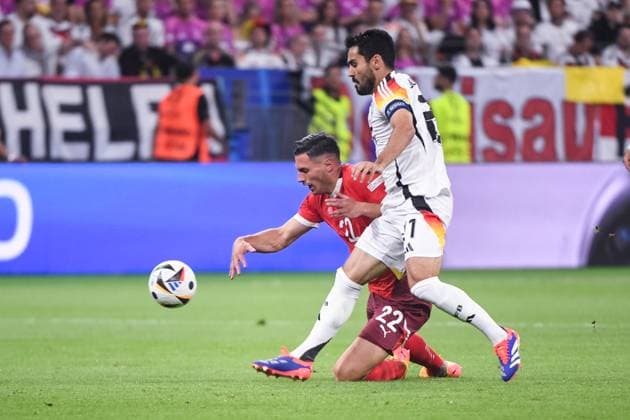 FRANKFURT AM MAIN, GERMANY - JUNE 23: Ilkay Gundogan of Germany R) against Fabian Schar of Switzerland L) during the UEFA EURO, EM, Europameisterschaft,Fussball 2024 group stage match between Switzerland and Germany at Frankfurt Arena on June 23, 2024 in Frankfurt am Main, Germany. Frankfurt am Main Frankfurt Arena Hesse Germany Copyright: xJustPictures.ch ManuelxWinterbergerx jp-en-EuSpIm-JP4_MAN_Scotland_Swiss_19Jun2024_CO_00056