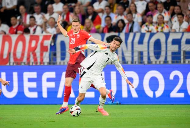 v.l. AEBISCHER Michel (SUI), Kai HAVERTZ (GER) Aktion, Zweikampf, Vorrunde 3. Spieltag, Gruppe A, Match M25, Schweiz (SUI) - Deutschland (GER), am 23.06.2024 in Frankfurt Deutschland. Fussball Europameisterschaft 2024 vom 14.06. - 14.07.2024 in Deutschland. Â