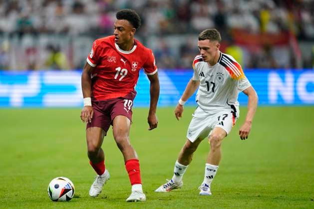 GER: Switzerland v Germany. UEFA EURO, EM, Europameisterschaft,Fussball 2024 Dan Ndoye of Switzerland and Florian Wirtz of Germany during the UEFA Euro 2024 match between Switzerland and Germany, Group A date 3, played at Frankfurt Arena on June 23, 2024 in Frankfurt, Germany. kpng Copyright: xSergioxRuizx xPRESSINPHOTOx PS_240622_SUI_ALE_011