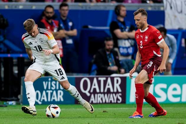UEFA EURO, EM, Europameisterschaft,Fussball 2024: Schweiz - Deutschland; 23.06.2024 Maximilian Mittelstädt (Deutschland, 18), Silvan Widmer (Schweiz, 3). UEFA EURO 2024: Schweiz - Deutschland; Frankfurt Arena, Frankfurt am 23.06.2024 Copyright: xBEAUTIFULxSPORTS Wunderlx
