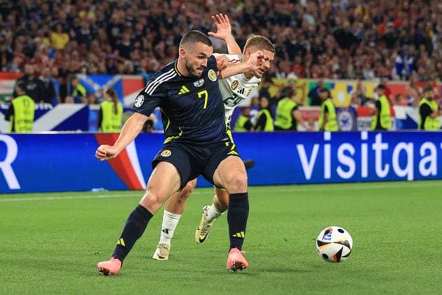 Football - UEFA EURO, EM, Europameisterschaft,Fussball 2024 - Group A - Scotland v Hungary 23rd June 2024 - UEFA EURO 2024 - Group A - Scotland v Hungary - John McGinn of Scotland and Marton Dardai of Hungary - Photo: Simon Stacpoole Offside. Stuttgart Germany Copyright: xSimonxStacpoolexOffside