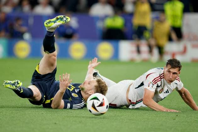 Scotland v Hungary: Group A - UEFA EURO, EM, Europameisterschaft,Fussball 2024 Stuart Armstrong of Scotland is brought down by Willi Orban of Hungary but a penalty was not given during the UEFA EURO 2024 group stage match between Scotland and Hungary at Stuttgart Arena on June 23, 2024 in Stuttgart, Germany. Stuttgart Stuttgart Arena Germany Germany Copyright: xRichardxSellers Sportsphoto APLx 14042360