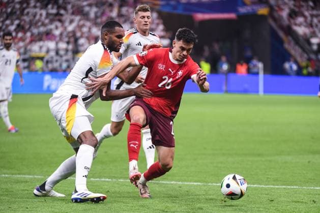 FRANKFURT AM MAIN, GERMANY - JUNE 23: Fabian Rieder of Switzerland R) fights for the ball with Jonathan Tah of Germany L) during the UEFA EURO, EM, Europameisterschaft,Fussball 2024 group stage match between Switzerland and Germany at Frankfurt Arena on June 23, 2024 in Frankfurt am Main, Germany. Frankfurt am Main Frankfurt Arena Hesse Germany Copyright: xJustPictures.ch ManuelxWinterbergerx jp-en-EuSpIm-JP4_MAN_Scotland_Swiss_19Jun2024_CO_00084