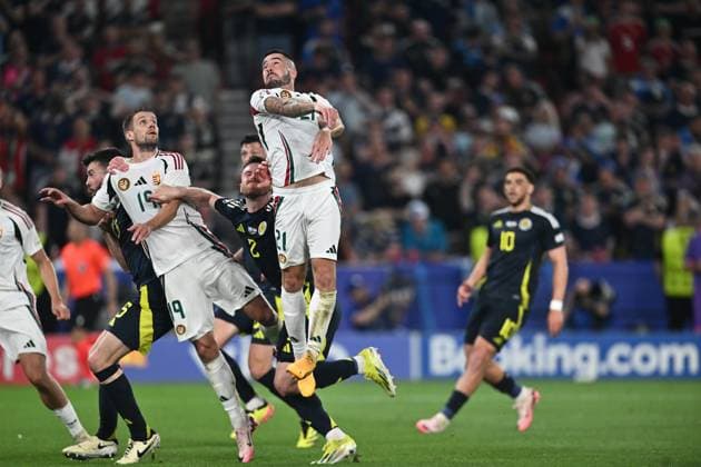STUTTGART, GERMANY - JUNE 23: Barnabas Varga of Hungary just before he goes down with a serious head injury during the UEFA EURO, EM, Europameisterschaft,Fussball 2024 group stage match between Scotland and Hungary at Stuttgart Arena on June 23, 2024 in Stuttgart, G Scotland v Hungary: Group A - UEFA EURO 2024 Copyright: xSebastianxFrejx